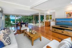 Leave the rest of the world behind when you come home to your own piece of paradise adjoining tranquil bushland, this spacious family home enjoys picturesque Middle Harbour & national park vistas. Focused around open plan living, the dining/living space flows to an expansive entertainers´ deck through sliding doors. Other features include, a separate games room with wet bar, bedrooms with ensuites, air conditioning and internal access to the DLUG. Nestled in an exclusive cul-de-sac, with water access via a bushtrack, only minutes from schools, shops and beaches, it provides a magical escape of peace & seclusion with easy access to the city. Amaze and entertain guests with your (never to be built out) views and surrounds. • Captivating views to the leafy upper reaches of Middle Harbour • Dual level contemporary residence placed on easy care grounds • Sweeping light filled open-plan living space • Giant glass bi-fold walls reveal the views and open to the terrace • Games room with pool table, wet bar and views • Timber flooring, air conditioning • All bedrooms with built-ins and ensuites • Home office with built-in desk • Stylish contemporary bathrooms with CaesarStone vanity tops • Only minutes to transport, schools, village shops and beaches • Remote controlled double lock-up garage with internal access A magical escape with sublime views close to the city!