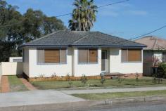  11 Lambert Street Cessnock NSW 2325 A great centrally located weatherboard and tile family home is perfect for the 1st home buyer or investor alike. Features of the home include 3 bedrooms 1 with built in robe, 2 spacious living areas, ducted air conditioning, polished floorboards, combustion fireplace & an updated kitchen & bathroom. Outside features include a lovely sunny deck that overlooks the backyard, garden shed, Single lock up garage with a workshop area. 