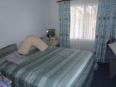  8 Railway Parade Injune QLD 4454 $270,000 Neg. Lowset 3 bedroom home in a thriving small town.Open Plan living area opening onto front verandah. Lounge has reverse cycle air-conditioning, fan & wood heater. Kitchen has electric stove, dishwasher & rangewood. Main bedroom is carpeted, built-ins and ceiling fan. Main bathroom has shower, toilet and another separate toilet. Laundry with linen cupboards. Access to 2 car garage from house! Side verandah with ramp. Huge outdoor area at rear of house with established gardens and palm trees. House is connected to 2 x 13600 Rain Water tanks as well as town water. 8x8 metre steel shed with cemented floors at rear of house with single three phase power. Tenure Type: Leasehold $800 yearly.   Read more at http://roma.ljhooker.com.au/C8HG2#21cyxwuFbI1Flcbi.99 
