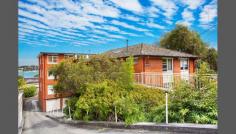 1/295 Victoria Place, Drummoyne, NSW 2047 Presenting an appealing open plan design, this delightful first floor unit is peacefully positioned in a popular location. Perfect for investors and first home buyers alike, it is in a convenient enclave only moments to city buses, a walk to Drummoyne village shops, restaurants, Five Dock Bay and waterside parkland. Open lounge/dining and fresh modern open kitchen Double light washed bedrooms, down lights Smartly renovated contemporary bathroom Balcony, lock-up garage plus storage compartment 