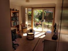  2/9 Blake Street Wilsonton Qld 4350 This home sized unit expresses elegance throughout. It offers 3 built in bedrooms, 1 bedroom with ensuite and a bathroom with a full bath. Large living area, large dining and a well appointed modern kitchen with gas stove and electric oven. There is natural gas and a reverse cycle air conditioner. There is also a fully fenced courtyard/entertainment area, neat small grass yard bordered with landscaped gardens, 1 good sized garden shed/storeroom has power and there is a double garage. 