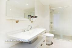  50/63 Ainslie Avenue Braddon ACT 2612 The Gatsby Conveniently located within a 5 minute walk of the Canberra Centre and situated on the first floor of the popular Gatsby development this immaculately presented 1 bedroom apartment boasts 73.5m2 of living area and combined 16m2 of outdoor living space.  The fabulous northerly aspected living opens via sliding doors onto a covered balcony which overlooks a tranquil beautifully landscaped common area, away from the hustle and bustle of busy streets.  The modern kitchen features, beautiful natural stone bench tops, Miele stainless steel appliances and copious storage whilst the spacious modern bathroom has access from both the bedroom and living areas giving occupants the convenience of an ensuite. The bedroom features its own private balcony which opens to allow a beautiful cross draft through the apartment whilst the living area features ducted reverse cycle heating and cooling. Additionally the apartment features intercom, lift access, basement parking and a storage locker.  - North facing  - 73.5m2 of living  - Security intercom  - Reverse cycle ducted heating and cooling  - Balconies  - Secure basement parking General Features Property Type: Apartment Bedrooms: 1 Bathrooms: 1 Eco Friendly Features EER (Energy Efficiency Rating): Medium (6.0) $399,950 