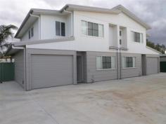 70 Marian Street Miles QLD 4415 $369,000 At $369,000 these brand new townhouses represent the best value in today's market. Here is your opportunity to purchase one of these townhouses and start securing your future investment. If you are considering building in Miles, just stop and do your figures; 4 bedroom, 3 bathroom and ready to rent out immediately. Don't wait for your project to be finished and incur any delays, your investment is here and ready to go now!  * 4 large bedrooms all with built-ins * 3 bathrooms * 2 storey townhouse with fully ducted air-conditioning * Modern kitchen with dishwasher * Open plan Lounge and dining area * Single lock-up garage * Each townhouse has a private courtyard 