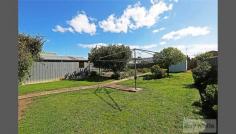 519 Thompson Road, Norlane, VIC Situated on Thompson Road in Norlane is this neat and tidy 3 bedroom aluminum clad weatherboard home, complete with practical kitchen/meals area, separate lounge, functional laundry, separate toilet and good size bathroom. The home has high ceilings, ornate cornice and a family feel to the home. Stepping outside you will be amazed by the amount of space. Potential plus is how you describe this allotment. With a 5 meter wide driveway, steel garage, veggie patch, garden shed, a fruiting lemon tree and approximately 736m2 of land the options on this site are endless. (STCA) Don't miss out on securing a large block of land in a central area of Norlane, with a home you can move straight into.