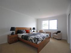  Bermagui NSW 2546 Enjoy ocean views from the living area and balcony or a short walk over reserve (opposite) to an unspoiled beach, yet right in town. Each townhouse has a large upstairs patio to soak up the ocean and reserve views and the smell of the seaspray and a single garage with internal access. Unit 4 includes a purpose built (huge) boat store garage design for big boats, caravans or storage. A really lovely outlook in an outstandingly convenient location. Don't delay inspect today. 