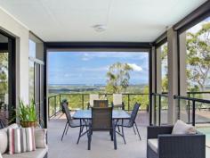  59 Midway Terrace Pacific Pines QLD 4211 $749,000 - $789,000 Owner already moving out - it's time to present your offers! 
Located in the highly sought after Vue 360 precinct, this prestigious 
home sits on a prime block taking advantage of picturesque views of the 
Pacific Ocean and Gold Coast skyline including Surfers Paradise. The WOW
 factor of this stunning home is sure to impress everyone that walks 
through the front doors. This is one of those rare opportunities that 
should not be missed as homes like this don't come on the market every 
day. 
 
Features include: 
 
4 generous sized bedrooms (2 downstairs & 2 upstairs), all with their own air conditioners and ceiling fans 
Large Master bedroom with walk-in wardrobe, it's own balcony overlooking
 the Pacific Ocean, and large ensuite with double vanity, spa bath, 
large shower and heated lamps 
Modern Master bathroom downstairs with deep bath, large shower, and heated lamps 
Lounge/media room with ocean views and surround sound in the ceiling 
Modern open concept kitchen with new Stainless Steel appliances and views of Surfers Paradise with plenty of cupboard space 
5kw German solar inverter & 3kw Canadian solar panels 
Expansive outdoor Alfresco entertaining area with automatic blinds to block out the sun 
High ceilings and balcony upstairs that overlooks the living areas downstairs 
Fully Landscaped yard with fenced pool and wood deck overlooking the ocean & Gold Coast skyline 
Solar heating for the swimming pool 
Double car lock up garage 
Back to base security system & security screens throughout 
Bespoke curtains throughout 
Plenty of storage throughout the house 
Expansive separate laundry 
Rainwater tank to water the gardens 
 
Sitting on a pristine private block with no neighbours behind or one 
side makes this an extremely rare opportunity to claim one of the best 
views on the Gold Coast! Owners are motivated to sell, so don't delay 
book your inspection today! 
 
   Read more at http://pacificpines.ljhooker.com.au/N9GGMK?play=1#XjJyp8xzAG4BxEtu.99 