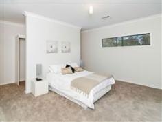  23b Bernhardt Crescent Hahndorf SA 5245 Bursting with Brilliance! Retirees take note! This smart and stylish custom built home has just been completed. The masterful design offers loads of space and refreshing innovations for its new owners to move straight in and simply enjoy. Brand new means it's in mint condition. Positioned in a highly desirable location in the ever sort after area of Hahndorf within walking distance to amazing eateries, shops, school, bus services and more. A striking secure gated entry way, sealed driveway and extensive paved parking areas will certainly impress. Generous grounds of approx. 964m2, fully fenced and secure, landscaped surrounds, lovely lawn area, rain water tank and triple garage with drive through access to an area all set up specifically for campervan/boat/extra vehicle/trailer storage. Internal access from garage to kitchen is ideal for convenience. Stunning charcoal colour schemes decorate throughout, sparkling tiled floors and soft carpet areas, high ceilings, ample storage, reverse cycle ducted air conditioning and gas hot water are a few extras.  The ingenious central kitchen has been set up to be social, expansive bench top with breakfast bar provisions and packed full of modern conveniences. General Features Property Type: House Bedrooms: 4 Bathrooms: 2 Land Size: 964 m² (approx) Indoor Features Ensuite: 1 Air Conditioning Outdoor Features Garage Spaces: 3 Other Features Property condition: Excellent Property Type: House 