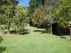  23 Bank Street Jamieson VIC 3723 JAMIESON TOWNSHIP Situated at the entrance to the beautiful village of Jamieson and directly opposite 2 major rivers and lake Eildon. This lovely weatherboard home comprises 4 bedrooms, 2 living areas, lovely big kitchen, covered outside entertaining area and beautiful established shade trees.  Walk to general store & local pub.  Adjoining vacant block also available. General Features Property Type: House Bedrooms: 4 Bathrooms: 1 Land Size: 1460 m² (approx) Price per m²: $198 Indoor Features Reverse-cycle Air Conditioning Outdoor Features Carport Spaces: 2 Open Car Spaces: 2 Outdoor Entertaining Area Shed Fully Fenced Eco Friendly Features Water Tank $289,000 