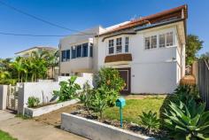  63 The Corso Maroubra NSW 2035 Located close to Jack Vanny Memorial Park this enormous semi is the perfect home for a growing family. With over two hundred square meters of internal space, accommodation can be organised to suit the needs of individual families. The main entrance hall leads to the lounge that opens into the dining room positioned next to the kitchen. The modern kitchen includes granite bench tops, a gas stove top and stainless steel appliances. Adjacent to the dining room is a bathroom and study (or fifth bedroom) that opens onto the rear yard. The room to the north of the entrance can be used as a family room or bedroom and includes an attached sunroom. The upper level consists of three bedrooms and main bathroom. The master bedroom includes a walk-in-robe and takes advantage of coastal and ocean views to the north. Features of the building include polished timber floors, ornate ceilings, and bay windows. A laundry and garden shed are positioned in the rear yard and the property is secured with an integrated security alarm system. The garage is situated on the lower level. Large areas for storage are also positioned under the house.  The Corso is a quiet street. Maroubra Beach can be access via a ten minute walk through the park and the Mahon Ocean Pool is within 200 meters of the front door. Transport routes and café’s are located nearby. 