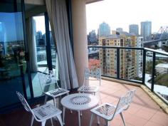  Goodwin St Kangaroo Point QLD 4169 You will have a hard time finding a property with a more impressive 
outlook than this one. The views from the 14 th level span approximately
 270 degrees and can be best appreciated from any one of the apartments 
four balconies. The fully air-conditioned interior comprises three 
bedrooms, the main bedroom's marble encased ensuite provides twin vanity
 basins and full size bath. The kitchen's granite bench tops and quality
 European appliances are everything you might expect. The expansive 
living and dining areas are light, open and invite the outdoor vistas 
inside. 
 
Quality buildings offer top quality amenities and this dockside tower is
 no exception. A foyer sure to impress all your visitors, sensational 
indoor lap pool, gymnasium, spa, sauna and beautifully manicured gardens
 that lead down to the riverside boardwalk, ferry terminal, shops, 
cafes, etc etc. 
 
If a relaxing lifestyle is as important as easy access to the CBD then 
this property should hit the spot with the most discerning sector of the
 property market. 
 
Call us today on (07) 3249 6868 to arrange your inspection. 