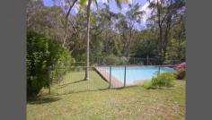  Roseville NSW 2069 There is plenty of scope for the growing family in this solid full brick family home. Architecturally designed and built in 1979, this home offers spacious formal and informal living areas. Full brick construction situated in a quiet child safe cul de sac with peaceful bushland views of Ku-ring-gai National park on 825 (approx) m2 of land. Features include: * Generous sized main bedroom with ensuite  * 3 additional bedrooms, two with large built in robes * Formal dining room flows to lounge with 16' cathedral ceilings  * Modern kitchen with granite benches and plenty of cupboard space * Large open plan family area adjacent to the kitchen including a separate area with wood burning slow combustion fire * Beautiful black butt timber floors throughout the family and bedroom areas  * Spacious double lock up garage with level entry to the family room and kitchen * Downstairs is a large area suitable for home business, in law accommodation or self contained granny flat the option is yours 