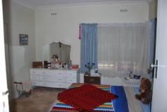  11 Moore St Katamatite VIC 3649 $160,000  This appealing 3 BR WB home is sited on a large 1/2 block in a great location. Features open plan living. Three bedrooms, two with BIR's. Two bathrooms. Solid fuel heater and evaporative cooling. Rewired just last year. Full lock-up garage and garden sheds. Well fenced yard with all the room you will need. 