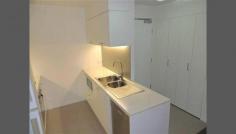  27/17 Roseberry Street Gladstone Central QLD 4680 YOU NEED TO TAKE A LOOK AT THIS!!! The Owner wants this sold and has the hard decision to meet the market. This ideally positioned CBD apartment is in walking distance to restaurants, pubs and fine dining. Also near schools, shopping centres, speciality shops and medical services - this really is the Pinnacle of locations. * 2 Great Sized Bedrooms - 2 Bathrooms * Open Plan Living and Dining opens to Modern Kitchen * Security Assured - security pass required to activate lifts - Intercom * Single lock up Garage * Building completed in January 2012 If you are looking for a great buy, and sick of overpriced units, this is the exception - buyer value guaranteed. General Features Property Type: Unit Bedrooms: 2 Bathrooms: 2 Outdoor Features Garage Spaces: 1 