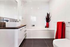  105/18 Bent Street Kensington VIC 3031 Luxury and Lifestyle with Spectacular City Views This stunning two bedroom apartment within “The Kensington” boutique complex, epitomises everything urban living represents, boasting an ideal city fringe location, generous open floor plan and contemporary, elegant design. Bathed in natural light, a central gourmet kitchen separates dining and lounge, spilling seamlessly onto a huge entertainer's balcony with spectacular, sweeping city views. Stone wrapped island/meals and bench tops, luxury stainless steel Smeg appliances, glass splashback, pull out pantry and soft close Hettich drawers feature in the crisp, white kitchen, whilst the lounge boasts a sleek, minimalist fireplace. Two large double bedrooms with generous built-in robes, deluxe master with spacious fully tiled ensuite including bath, and a large private balcony, also with city views, provide excellent accommodation. Safety and ambience have been incorporated with central video surveillance, intercom, secure building and underground carpark (with storage) entry and a landscaped, elevated garden in the enormous complex courtyard. Other impressive features include reserve cycle air conditioning, quality carpets, tiles and timber flooring. General Features Property Type: Apartment Bedrooms: 2 Bathrooms: 2 Outdoor Features Carport Spaces: 1 