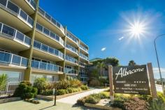 1/16-18 OCEAN VIEW AVENUE Merimbula NSW 2548 Quality apartment with spectacular panoramic water views across 
Merimbula Lake located a short stroll to the shops, restaurants and 
café’s in Merimbula town centre. 
	Number 1 “Albacore Apartments” offers 4.5 star fully self contained 
accommodation with 2 bedrooms, 1 bathroom and generous size open plan 
living area and a private deck space to enjoy the views. 
	The unit comes fully furnished and equipped, including dishwasher, 
microwave, and laundry, reverse cycle air conditioning, TV, DVD and HI 
FI system. 
	This is an excellent opportunity to secure a managed holiday rental 
unit which is serviced by on site management and currently showing 
excellent rental returns. 