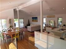  32 Mitchell Street South Mission Beach QLD 4852 Vacation, Vacation, Vacation All successful holiday homes have one thing in common….location, location, location! And you will feel as though you are on R&R as soon as you cross the threshold! This stunning multi-level home will have you unpacking your bags in moments. Constructed over multi levels, this contemporary beach house is bathed in natural light and finished in light and neutral colours to highlight the beautiful Coral Sea and Dunk Island views. The street frontage is deceptive and reveals only the high clearance boat and carports. More is unveiled as you wander up the driveway where an additional 2 boat or car spaces are overshadowed by the fantastic pool area complete with bbq pavilion and bathroom. The home is air conditioned yet natural air flow via louvres and expansive sliding doors to decks and pool areas, will ensure the power bills are low. The central level is dedicated to open plan living, a gourmet kitchen and wide deck where the views are truly tantalising. All this and you are one street back from the beachfront.  Let the pictures tell the story and contact marketing agent Melissa Thurgood for further information and to schedule  General Features Property Type: House Bedrooms: 3 Bathrooms: 3 Land Size: 969 m² (approx) Price per m²: $717 Indoor Features Toilets: 3 Air Conditioning Outdoor Features Garage Spaces: 4 Swimming Pool - Inground Other Features Built-In Wardrobes,Garden,Polished Timber Floor,Terrace/Balcony 