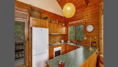  5964 Wisemans Ferry Rd Dharug National Park Gunderman NSW 2775 We believe this wonderful Appalachian Log' home truly has the WOW factor and all the varying lines of the Cathedral Ceilings somehow is inspirational! This home is a Temple' featuring 3 bedrooms (as follows:-) Two large bedrooms downstairs (with built-ins) and a huge mezzanine' Loft that is versatile in as much it could be a wonderful Loft Studio' and huge Master Bedroom or just a huge Loft/Studio, overlooking the living area below from the Balustrade (again what an effect) or just as a Studio! The Kitchen is large, well thought out and of a complimentary design. A huge open plan living/dining area with magnificent views to the Hawkesbury River. This unique hide-away' property is blessed with fabulous River and Bush views, set in its majesty above the World' and yet has an excellent driveway access with ample parking for 3+ Cars and an easy turn-around area. The land area is 986m2 (approx.) of bush-land paradise with this beautiful home perfectly set in its surroundings with the National Park behind. Approx 12kms from Wisemans Ferry overlooking the picturesque Hawkesbury River and roughly only 50mins to Gosford and Hornsby. Rates: $1,045 per year. 