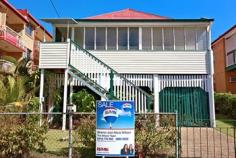  35 King St Annerley QLD 4103 MUST SELL THIS SATURDAY AT AUCTION 10AM ON SITE Great opportunity in this inner city hot spot This much loved property has been cared for by the current owner for over 67 years and offers the perfect location, potential and plenty of space. This home has a lot to offer with its original character features and fretwork. Other key features include: -Easy flowing floor plan with two generous sized bedrooms -Light and airy sun room/enclosed veranda -Formal lounge and dining room -Spacious eat in kitchen -VJ Walls -High ceilings The cottage has been built close to the front of the 412m2 block allowing plenty of room in the backyard. Situated in a highly sought after inner city neighbourhood, this property presents a great opportunity to the first home buyer, renovators and investors with plenty of potential for adding value by renovating and or by raising and building underneath. A perfect opportunity to capitalize on future growth. Location doesn’t get more convenient with public transport, Clem 7, M3, PA hospital and Buranda shopping centre all at your doorstep. This property will go to Auction at 10:00am Saturday 1st November 2014 on site if not sold before hand, prior offers are invited! 