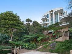  37 Battle Blvd Seaforth NSW 2092 Unforgettable in its innovative design and
 vast living and entertaining expanses, this contemporary deep 
waterfront showpiece is the ultimate lifestyle purchase. Set on an 
enviable 936sqm parcel of land cascading down to the waters of iconic 
Sydney Harbour, the property has been built for pleasure, boasting it's 
own direct waterfront access with full marina facility, including deep 
water jetty, ramp and pontoon with 20 year lease in place. Views can be 
enjoyed from most rooms. Gaze directly over The Spit, Clontarf Beach and
 right across the Harbour to Vaucluse and the Eastern Suburbs. Perfect 
in every way as is, the property can easily be styled to individual 
tastes with a privileged canvas of soaring ceilings, clean lines and an 
abundance of glass. Truly a world class property in an unrivalled 
setting with easy access to fine dining, village shops and schools. 
 
Accommodation: 
* Bold and creative floorplan maximising the outlook and natural light 
* Palatial open-plan living area, grand and vast interior spaces 
* Terraces off most rooms, enormous entertaining decks off living areas 
* State-of-the-art kitchen with breakfast bar and Smeg/DeLonghi appliances 
* Dedicated home cinema or rumpus room with surround sound system 
* 2 possible master bedrooms both with ensuites, views and balconies 
* Varied accommodation options, all bedrooms with built-in robes 
* Sleek designer bathrooms, spa bath, stunning distinct styling accents 
* Customised home office indulging in wonderful views and private balcony 
 
Features: 
* Boat pen and 40 foot deep water mooring with shared access 
* Discrete and secure entry, full video security system and alarm 
* Sprawling gardens and timber patio deck surrounded by lush greenery and views 
* Excellent appointments, glamorous light fittings, fireplace, polished tiles 
* Clever storage options, separate storage rooms and home bar 
* Automated double lock-up garage, additional driveway parking 
* Ducted reverse cycle air-conditioning, a host of modern conveniences 
 
Inspect: By Appointment 
Details: David Rothschild 0414 60 66 66 
 
 