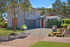  Lot D40   28 Hakea Circuit  Rothbury NSW 2320 Property Price  $699,000 This home offers great value and is based on one of the most sought-after designs at The Vintage with clever changes made to improve the transition between indoors and outdoors. With 4 bedrooms plus home office and 3 bathrooms this would meet the needs of a family needing more space or those who love to entertain. The 4th bedroom is a separate loft suite with ensuite and provides a perfect guest retreat with maximum privacy for you and your visiting guests. The excellent floor plan caters for today’s living, with light-filled open plan spaces complemented by stacking doors leading out onto a very spacious entertainer’s patio. The backdrop of magnificent mature gum trees adds to the sense of fresh air and space. Located in a crescent and surrounded by established homes, this beautiful 800sq/m parcel in Ironbark Hill is only minutes away to your newfound friends and neighbours at the Golf Clubhouse and recreation hub. Flowing indoor/outdoor living and entertaining spaces Open plan living/kitchen area with offset dining Separate study or media room Stainless steel European appliances Caesar stone bench top in the kitchen and bathrooms Spacious covered entertainer’s patio 