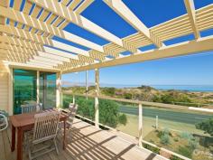  260 Esplanade Aldinga Beach SA 5173 What a perfect location overlooking Silver Sands Beach with views to the headland and beyond. Close
 to a stairway that leads down onto the beach and to a walkway across 
the sand dune to the sea. Also close to vehicle access and the Surf 
Club.
 Proudly positioned on a fabulous 1220 sqm block with a garden 
designed to be low maintenance and to blend in with the vegetation of 
the nearby Aldinga Scrub.
 The upper level of this beautiful home features an open plan living 
and dining area with a stunning vaulted ceiling and access to balconies 
front and back. The kitchen is also on this level, along with two 
bedrooms that both offer balcony access. Both have built-in wardrobes 
and the large master suite includes a bathroom.
 Two more bedrooms with built-ins are located downstairs, along with a combined laundry/bathroom.
 A second spacious living room leads out to a paved and covered 
entertaining area and then onto the delightful garden with seating areas
 shaded by native trees.
 Still referred to as "The Boat Shed", the lined and insulated 
free-standing rumpus room is a real bonus when friends and family come 
to visit. Fitted with cupboards, it makes an ideal spare bedroom and/or 
games room.
 The single garage under main roof has a panel lift door at each end.
 Whether you are looking for a quality built holiday house or a 
permanent residence along the Lower Esplanade, this is a "must see".
 