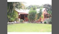  44 Greening Road Moodlu QLD 4510 RIGHT OUT OF BETTER HOMES AND GARDENS!! MODERN WESTERN RED CEDAR HOME + 2 ACRES OF LANDSCAPED GARDENS + NURSERY INFRASTRUCTURE + 5 MINS TO BRUCE HIGHWAY/BRIBIE OVERPASS!! This property has the 'WOW" factor and some!! The "positives" of this unique property are endless, but here we go! THE HOUSE: Modern Air-Conditioned Western Red Cedar home comprising of 3 Bedrooms with built in Robes Master with Ensuite and Walk-in-robe plus a Study (or 4th Bedroom) with built in floor to ceiling cupboards. Separate living area complete with Log Burner. Both Bathrooms are spacious and modern. Spacious verandahs along the front of the house with Screened Timber French Doors opening out on to it from Bedrooms and Living Areas. Plus 2 more large entertainment areas outside. Plus 3 spacious Outdoor Entertainment areas! THE STUDIO: Large Studio (approx 35m2 floor area) with attached Carport set back around 65 meters away from House. NURSERY INFRASTRUCTURE:- Huge Steel Framed, shade clothed Nursery Infrastructure in as new condition still in place with Potting Benches and irrigation. Also, huge Bird Aviary attached. General Features Property Type: House Bedrooms: 4 Bathrooms: 2 Land Size: 0.80ha (1.98 acres) (approx) Indoor Features Air Conditioning Outdoor Features Carport Spaces: 2 Garage Spaces: 3 Other Features Built-In Wardrobes,Fireplace(s),Garden,Secure Parking,Terrace/Balcony 