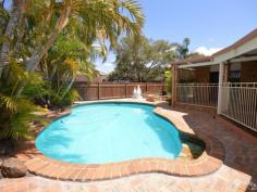  5 Murphy Ct Avenell Heights QLD 4670 $429,000 This four bedroom executive family home has all the extras, with 
separate sunken lounge and soaring raked ceilings, both formal dining 
and meals area.
 A new dream kitchen with an abundance of cupboard and pantry space, 
is serviced by electric hot plates, wall oven, dishwasher, plumbed in 
refrigerator and a convenient servery to the outdoor area.
 Light tiles are predominant throughout the home and there are 
several brick feature walls. The home is also fully air-conditioned for 
the upcoming warmer Summer months. A spacious family/theatre room is the
 ideal place for your guests and comes with built-in bar facilities.
 For peace and quiet an enclosed informal retreat overlooks the 
gardens below. The bathroom is sparkling with separate shower, gleaming 
two seat spa bath and vanity. The master bedroom has an abundant of walk
 through cupboards leading to the ensuite.
 A huge covered and paved outdoor entertainment area overlooks the 
fully fenced concrete saltwater pool and makes for plenty of family fun.
 Lush, low maintenance landscaped gardens creates an inviting welcome to
 the home.
 Solar power system (20 panels) to save or pay no electricity bills.
 Supermarket, butcher, baker & wine cellars are a leisurely stroll and schools both private and public are but minutes away. 