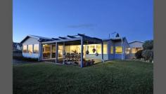 23 De Burgh St Ledge Point WA 6043 ABSOLUTE BEACHFRONT Classic Family Holiday Home on the waterfront at Ledge Point. a pristine holiday destination about an hour's drive North of the Metro Area. Evening alfresco entertaining, relaxing on the ocean front patio viewing the magnificent western sunsets. Walk off the patio direct on to the beach for a refreshing swim/ paddle, launch your own tinny for a spot of fishing. It really does not get any better than this. But wait, there's more. Development potential. Relax now, and develop later. Or just enjoy the remarkable ambience of this warm, true Aussie beach home. This property has been owned by the same family for over 30 years, which says it all. 