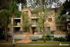  10/16 Frank Oliveri Drive Chipping Norton NSW 2170 Set amid a lush and leafy landscape offering a wide street frontage and 
overlooking park like reserves, this pristine apartment enjoys all the 
resort style amenities of a five star hotel such as tennis court & 
in-ground pool. Its tranquil garden position is coupled with spacious 
interiors to create a home of great warmth and tremendous appeal. 
 
Supremely located moments away from a selection of schools, reserves, 
shopping centre and Chipping Norton Lakes this home has it all, peace, 
privacy, security and convenience. 
 
Carefully designed and beautifully presented this apartment offers solid
 double brick construction, 2 sunfilled bedrooms all with built in 
robes, 2 modern bathrooms one being an ensuite and a stylish gourmet 
kitchen cleverly located between the lounge & dining area. 
 
With a host of quality extras such as secure car space, air conditioning
 and lots, lots more this home will please even the most fastidious 
purchaser or astute investor. 
 
We love 
- Large balcony with park outlook 
- Stylish neutral interiors throughout 
- Moments from Chipping Norton shopping centre, schools & lake. 
 
Pluses 
- 2nd floor apartment 
- Low maintenance living 
- Perfect home or investment opportunity. 
