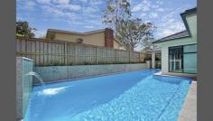 25 Cardinal Ave Beecroft NSW 2119 Desired Lifestyle. State-Of-Art Inclusions. Generous Proportions. One of a kind family home. A statement in design and build from the impressive entry foyer to the swimming pool wrapping around the living area. Set on 1,005sqm with easy access to Beecroft and M2/M7. This 2.5 year old residence offers a sleek contemporary layout, generous proportions and a clever mix of indoor/outdoor living. Four large bedrooms including two master bedrooms with ensuites. Flexible layout with second master bedroom privately positioned, potential in-law accommodation. Notable schools are Carlingford High, Cheltenham Girls' High, Mount St Benedict College, Arden Primary and West Pennant Hills Primary. - Grand entrance foyer. Sun drenched, open plan living & dining rooms. - Spectacular, gourmet gas kitchen with island bench and bulter's pantry. - European appliances. Built-in TV & sound system to living and alfresco areas - Solid Red Ironbark floorboards throughout. Ceramic tiles to wet areas. - Quality blinds and plantation shutters. Large bathrooms and laundry. - Zoned ducted air-conditioning. Ducted vacuum system. Video intercom. - Gas heated 12m pool with water feature linking living/alfresco areas. - 2 alfresco areas fitted with external sound system. Computer room. - 2 master bedrooms with ensuites and his/hers walk-in robes. - Triple auto garage with internal entry & rear courtyard access. - Quality features throughout. Sun drenched layout. Level block. 