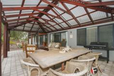  54 The Fairways Gnangara WA 6077 2.5 ACRES PLUS STUNNING HOME! BUSH LIVING IN THE METRO AREA! Bring the pony and the golf clubs! This beautiful property is low maintenance and set amongst gorgeous native bush, birds and trees, in the sought after "High side area of Gnangara" Stunning home with big glass doors, High atrium windows, wrap around timber decking, patios and entertaining areas with lovely elevated bush views. Especially designed for cooling & heating enjoying a big central feature fireplace, Feature fans to all rooms, and big central split air-conditioning. Huge open plan living with separate left wing for the Master bedroom and study and separate right wing for the minor bedrooms, bathroom & laundry. Privacy ensured! All rooms enjoy the stunning views! Huge king master bedroom with big glass doors to the decking enjoying awesome views. Spacious walk in robe and stunning big en-suite bathroom with deep luxury bath, big glass shower, feature vanity and quality fixtures Huge study/ or 5th bedroom. 2nd & 3rd Queen sized bedrooms both with double built in robes Double doors to 4th . General Features Property Type: House Bedrooms: 4 Bathrooms: 2 Building Size: 216.00 m² (23 squares) approx Land Size: 1.01ha (2.50 acres) (approx) Indoor Features Ensuite: 1 Open Fireplace Outdoor Features Garage Spaces: 4 Other Features RCDs, Deck, Verandah, Terrace/paved, Outdoor entertainment area, Undercover outdoor area $1,149,000 