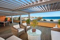  301 & 401/152 Campbell Parade Bondi Beach NSW 2026 Offering rare luxury, space and panoramic views 
stretching from Ben Buckler Point to Icebergs with an enviable vantage 
point directly opposite the centre of Bondi Beach, this immaculately 
presented apartment has to be among the finest in Sydney. 
 Spacious in/outdoor living with impeccable designer finishes 
Spanning two half floors with lift access to both levels 
Interiors flow over 490sqm to 383sqm of private terrace 
Sun soaked decks feature weather-sensitive Vergola roofing 
 Expansive open plan living areas with views on both levels 
Theatre room with drop down projector screen, library/study 
Chef’s gas kitchen, deluxe master suite, designer bathrooms 
Security parking, boutique hotel-style lobby with concierge 
Discrete entrance from the pedestrian mall on Roscoe Street 
A retreat just footsteps to the beach, cafes and restaurants 