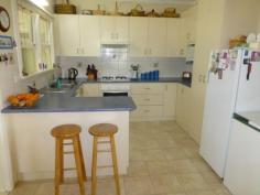 1 Brolgan Rd Parkes NSW 2870 Relax & Enjoy $228,000 This three bedroom home has heaps of appeal and a peaceful outlook across the native garden with views of town, There is a large open plan lounge/ dining room, new kitchen with breakfast bar, pantry, electric under bench oven & natural gas cooktop. There is also an enclosed sunroom, small office and second toilet. With natural gas hot water and heating as well as a split system a/c. Stroll outside and enjoy the landscaped garden, carport with access to the back yard and garage/workshop. This is a very good home at the right price so call to arrange an inspection today. 