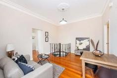  3/63 Douglas Street Stanmore NSW 2048 This Strata apartment (or 'maisonette') offers a rare combination to 
the discerning buyer. The interior has a New York-style black wrought 
iron spiral staircase, pristine wooden floors, white walls and recessed 
lighting made possible by the high ceilings and original cornices. 
 
The exterior is of European rustic provincial farm house style, with stressed shutters and even a few 'medieval' flourishes. 
 
It is the ideal find for that person looking for a complete departure 
from the plastic shiny minimalist perfection. An unusual original 
strata apartment Circa 1930 with character, privacy and flexible floor 
plan occupying 2 levels. 
The unit is situated to the rear of a block of 9 security apartments with an entrance on each level. 
 
Features include: 
* 2 double bedrooms, main with B/In wardrobes 
* 1.5 bathrooms, main with tub. 
* Internal laundry 
* Living/dining area 
* Brand new kitchen offering stainless steel appliances, granite bench tops, plenty of cupboard space and pantry 
* Solid timber floors 
* Air conditioned bedroom on each level 
* Timber venetians and full drop quality curtains for extra privacy 
* Double- glazed windows. 
* Full security on all windows and entrance doors. 
* Entrance door on each level 