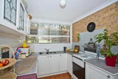  6/4 Mosman Place Raymond Terrace NSW 2324 Located in Lakeside & within easy walking distance to shops, schools & childcare. This 2 bedroom townhouse has a great outlook onto the neighbouring parkland. . Features: -2 Bedrooms, the main is approximately 5m x 3m with built-in robe -Renovated bathroom & kitchen with walk in pantry -Open planned lounge & dining with floating timber floors -Glass sliding doors opening onto an open courtyard and well maintained lawns -Internal brick feature wall -Single carport -2nd toilet in laundry -Plenty of storage throughout   
