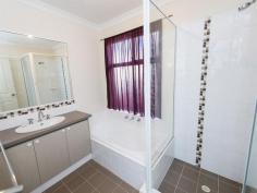  4/13 Devonshire Terrace Armadale WA 6112 Stop Renting! Perfectly Priced Home That Could Be Your Own Are you tossing up whether to build or buy an established home? Are you a first home buyer looking for an affordable home to fit your budget without compromising on the quality? Well look no further because this home ticks all the boxes. This well presented and modern home offers an ideal addition to an astute investor's portfolio or first home owner's opportunity. The home is situated close to desirable amenities including Armadale Shopping Centre, Armadale Senior High School, Gwynne Park, Armadale Train Station and bus routes. Entering the home, the master suite is to your right with a generous walk in robe and ensuite offering vanity, shower and toilet. Down the hall there are 2 other bedrooms with built in robes which are serviced by the main bathroom containing bath, shower, and vanity with separate toilet by the laundry. The modern kitchen is equipped with a 4 burner stainless steel cooktop, stainless steel oven and stainless steel rangehood overlooking the dining and family room. Outside you will find a very low maintenance courtyard with room for a bbq for cosy family gatherings. General Features Property Type: Unit Bedrooms: 3 Bathrooms: 2 Outdoor Features Garage Spaces: 2 