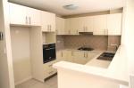  9/9-11 Kleins Rd, Northmead, NSW 2152 As new large beautifully presented 2 bedroom unit, offering tiled living area, Built-ins, en-suite to main, dishwasher & dryer, split system air-con, large balcony, alarm & video intercom, underground security parking, located close to shops & transport. 