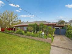 7A Cambridge Crescent White Hills VIC 3550 Tucked away off the main road yet only minutes from the CBD and convenient to all amenities, this three-bedroom brick-veneer home is an excellent buy. Primary and secondary schools, a post office, chemist and other shops are all close by and there's a bus route on Napier Street. It would suit a range of buyers from a professional couple, to downsizers, investors and first home buyers. Double gates on the driveway open to a single carport, while further in, there's a large shed with a concrete floor and power. From
 the verandah, a front door opens to a good-size lounge room which has a
 wall-mounted air-conditioner. Through a wide opening is a kitchen and 
dining area with a suede-finish feature wall. The kitchen has an upright
 gas stove, and plenty of storage space above and below the benchtops. A
 hallway extends from the kitchen to the three bedrooms. All have 
built-in wardrobes and ceiling fans while one has a wall-mounted 
air-conditioner. Ducted heating is throughout the home as well. Also 
along the hallway are two-door linen storage, a four-piece bathroom and a
 laundry that opens to an outside ramp, under a second verandah, leading
 to the back garden. A garden shed with a concrete floor is another 
addition in the low-maintenance back garden where a number of fruit 
trees are happily growing, including apple, peach and apricot. This is a great opportunity to buy a well-priced home and make it your own.						 