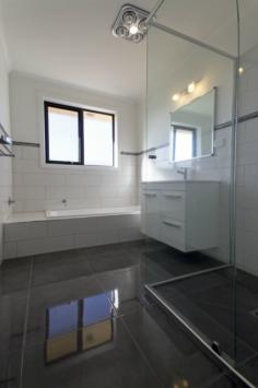  2/11 Isabelle Court Wynyard Tas 7325 Price: $269,000 WOW FACTOR An abundant in natural light with impressive finishes and open flowing floor plan are just a few of the features of this unit. Features include:- - 2 Generous sized bedrooms both with built-in wardrobes - Modern kitchen with wall oven, ceramic cooktop and dishwasher - Open plan living area which enjoys the afternoon sun and is heated by Daikin heat pump - Grey gloss tiles in kitchen, dining and bathrooms areas and high quality woollen carpet - Spacious bathroom with separate bath and semi frameless shower unit - Separate toilet - Remote single garage with internal access to the unit - Additional car parking at front of garage The unit is well positioned (only 2 on the block), fully fenced and private. Conveniently located, walking distance  to local amenities including Medical Centre, Shops, beach and walking tracks. Thinking of downsizing, call to organise an inspection. 