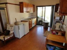  2 Ryan Street South Grafton NSW 2460 A delightful 4-bedroom weatherboard residence plus the "old corner store" ! 
 
Features include: a large central living room opening onto the front 
verandah; 2-bathrooms including a huge en-suite; dining area off the 
kitchen; polished flooring; ducted air-conditioning; side and back 
verandahs. 
 
The "old shop" has a wonderful facade of a bygone era and comprises an 
expansive shop floor area plus a utility room with toilet and basin. The
 Business Zoning adds all sorts of possibilities here ! 
 
A handy location to the South Grafton business area yet nicely tucked 
away in a private location. Enjoys an elevated site with a lovely 
northerly aspect. 