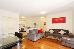  1/80 - 88 Cardigan Street Guildford NSW 2161 Immaculate ground floor 2 bedroom unit located only a stone's throw away from the Station, Shopping Centre and all other amenities in a security complex offering open floor plan with L shaped lounge & dining opening onto a large balcony, spacious polyurethane kitchen with granite bench top and gas cooktop, 2 good sized bedrooms, main with built-in & 2nd balcony, bathroom with spa bath, laundry with 2nd toilet and a fully secured lock up garage. MOVE RIGHT IN & PUT YOUR FEET UP. 