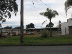 66 Kularoo Dr Forster NSW 2428 Large rental frame metal factory on prime corner site in Forster, 50.4 metre frontage to Kularoo Drive and average depth about 57 metres (total area 2912m²). Factory consists of Front Office Reception to Kularoo Drive with double sliding door access/lunchroom/shower/WC and contains a total area of 573m² (37 x 15.5) with 230m² of mezzanine storage. Agent’s comments: Property located on busy main thoroughfare through Forster Industrial area giving access to One Mile Beach residential areas, close to Forster Shopping Centre and enjoys excellent passing traffic exposure. Suit many industrial or secondary commercial uses and priced to sell quickly. Suitable to sub divide with vacant land to Kularoo Drive 25 metre frontage and 60 metre average depth 