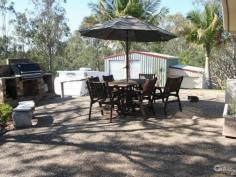  81-83 Scarvell Place Kooralbyn Qld 4285 $415,000 This immaculate brick 4 Bedroom 2 bathroom home on 4876m2 acreage land is pure joy to list.
 Situated in a rural setting with lifestyle facilities, this is a home that needs to be inspected to appreciate.
 The large kitchen with enormous amount of cupboard space, has open 
plan access to the living, media room, and formal lounge area. This has 
been beautifully decorated, made spacious, airy, and invites the outside
 in with large windows and glass doors. The covered and screened 
Patio the length of the home opens from these rooms, is the ideal area 
for entertaining, and where most Queenslander's live year round. The 
present owners watch the wildlife daily from here.
 The bedrooms are large, all with built ins, and the 
presentation of these rooms is a delight. The main bedroom has an 
ensuite and opens to the patio for morning coffee. The main bathroom has
 separate toilet.
 The above ground pool is fully fenced and easily accessible to the patio area.
 It is the paved barbecue area under the large jacaranda tree just 
off the Patio, which gives thoughts of evening drinks, with friends and 
family.
 There is a double lock up garage with access into the home.
 Additionally a "Man's Shed" 7 x 5.5 m with extension workshop.
 All the gardens have been landscaped and the driveways are 
immaculate, with separate entrance to the Man shed. There is also access
 here for a motor home or caravan.
 The back area of this acreage property, has been fenced to run a children's pony or horse with plenty of accessibility.
 This is a must see property
 Local Agent has exclusive listing and lives 2 mins away, so viewing is at any time.
 Rosemary Lawson-Quinn
 Servicing the Kooralbyn Area. 