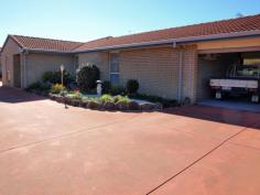  2/9 Blake Street
Wilsonton
Qld
4350 This home sized unit expresses elegance throughout. It offers 3 built in bedrooms, 1 bedroom with ensuite and a bathroom with a full bath. Large living area, large dining and a well appointed modern kitchen with gas stove and electric oven. There is natural gas and a reverse cycle air conditioner. There is also a fully fenced courtyard/entertainment area, neat small grass yard bordered with landscaped gardens, 1 good sized garden shed/storeroom has power and there is a double garage. 