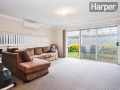 6/7 Fonda Avenue Rutherford NSW 2320 For Sale Offers over $350,000 This as-new contemporary home presents spacious interior living and quality throughout located in an exclusive family-friendly estate just 10 minutes to schools, shops and train station in Maitland town centre, and 45 minutes to Newcastle CBD and beaches. The home’s modern façade combines a full-brick exterior with timber accents and picture windows to build strong street appeal that blends seamlessly into this high-end estate. Enter into a wide tiled hallway that’s bathed in natural light and opens out into the spacious open-plan living/dining room. There are premium floor tiles to the dining area and as-new carpet to the living area that also features a distinctive horizontal picture window that drinks in abundant natural light. The living area opens onto an entertaining patio in the private backyard with a lawn and garden, and the dining area opens to an additional wrap-around verandah. Back inside, the premium designer kitchen adjoins the dining area and features large island breakfast bar, stone bench tops, quality stainless steel appliances including dishwasher, gas cooking and modern glass splashback. The immaculate main bathroom presents a generous glass frame shower, separate bath and modern vanity with stone top and above-bench vanity. The king-sized master bedroom offers a bright and sunny aspect and features a modern ensuite, also with glass frame shower and stone-top vanity. Bedrooms two, three and four are all of generous proportions, and a well-equipped internal laundry and double lock-up garage complete the package. This property features: -- Split-system air conditioning to the main living area  -- Premium floor tiles to kitchen, hallway and dining area  -- As-new carpet to the main living area and bedrooms  -- Quality fixtures and fittings throughout  -- Double lock-up garage with automatic roller door To view this property, please call Harper Property Agents on 1300 626 111 Inspections Sat, 01 Nov 01:00 PM - 01:20 PM Features General Features Property Type: Unit Bedrooms: 4 Bathrooms: 2 Indoor Ensuite: 1 Outdoor Garage Spaces: 2 