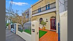  29 Rowe St Woollahra NSW 2025 This graceful 1920s terrace is currently configured as a combined 
specialist medical practice and live in residence, presenting an ideal 
opportunity for those who seek to work from home. Easily converted back 
to full residential use it offers four bedrooms with lovely high 
ceilings and period detailing throughout. Set in quiet cul-de-sac this 
convenient setting is moments to David Jones food hall, Bondi Junction 
Station and Westfield shopping, trendy cafes and parkland. * Formal/casual living, zoned home office * Eat-in timber kitchen with island bench * Sunny rear garden with Eastern aspect * Master with spa ensuite & private balcony * Pristine bathrooms, huge attic store, A/C * DLUG with access via Dawson Lane * First time offered in over 20 years! 