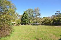  5 Winema Drive North Tamborine QLD 4272 Family Friendly Home with Endless Potential Offering large living all on one level situated on a completely level half acre block of land close to schools and only a short distance from the village centre but tucked away providing a private and leafy environment . This home provides the ideal opportunity for those looking for the perfect family home. Features Include 4 bedrooms 2 bathrooms Massive master bedroom with renovated ensuite and walk in robe Large living, kitchen and dining areas Rear veranda overlooking the back yard Fully fenced, flat rear yard Large rumpus room / converted double garage Steel frame construction Solar power This property is currently tenanted and 24 hours notice is require prior to all inspections. Call for more information or to book your private inspection appointment. General Features Property Type: House Bedrooms: 4 Bathrooms: 2 Land Size: 2040 m² (approx) Indoor Features Air Conditioning Open Fireplace Outdoor Features Carport Spaces: 2 