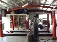  Roger Moore Crescent Warialda NSW 2402 Situated on a 2034m² block  with security fence & access through 
two sets of double gates. The land has been gravel filled & packed 
and is well drained. This all steel workshop has been built for approx 
15yrs is 184m²(60’x33’x14’) which includes a lock-up office with A/C, 
lock-up parts cage, a 5 tonne loft above office & three phase power. 
 The shed is served by two side roller doors opening onto a concrete 
apron(120m²), one front roller door and a side access door. Included in 
this sale is a 4 tonne hoist, Large compressor, 40/ Container, Water 
tank, Benches, Vyces, Grinder and three storage cabinets. 