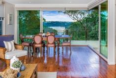 Leave the rest of the world behind when you come home to your own piece of paradise adjoining tranquil bushland, this spacious family home enjoys picturesque Middle Harbour & national park vistas. Focused around open plan living, the dining/living space flows to an expansive entertainers´ deck through sliding doors. Other features include, a separate games room with wet bar, bedrooms with ensuites, air conditioning and internal access to the DLUG. Nestled in an exclusive cul-de-sac, with water access via a bushtrack, only minutes from schools, shops and beaches, it provides a magical escape of peace & seclusion with easy access to the city. Amaze and entertain guests with your (never to be built out) views and surrounds. • Captivating views to the leafy upper reaches of Middle Harbour • Dual level contemporary residence placed on easy care grounds • Sweeping light filled open-plan living space • Giant glass bi-fold walls reveal the views and open to the terrace • Games room with pool table, wet bar and views • Timber flooring, air conditioning • All bedrooms with built-ins and ensuites • Home office with built-in desk • Stylish contemporary bathrooms with CaesarStone vanity tops • Only minutes to transport, schools, village shops and beaches • Remote controlled double lock-up garage with internal access A magical escape with sublime views close to the city!