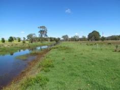 237 Broadwater Rd Dungarubba NSW 2480 Grazing or Sugarcane ... The Choice is Yours 
 Approx 155 acres of river flats ideal for grazing or sugarcane 
 
* Channel running through the middle for water and drainage 
 
* Scattered timber, boundary & internal fencing in fair condition 
 
* Approx.10 km to Broadwater & about the same to the beaches at Evans Head. 
 
This property offers someone a timely opportunity to enter the rural market 
 
 